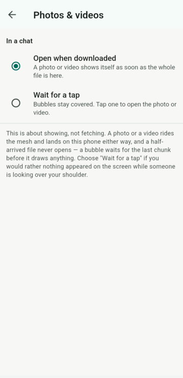 The photos and videos setting: open when downloaded, or wait for a tap so nothing appears on screen while someone is looking over your shoulder.
